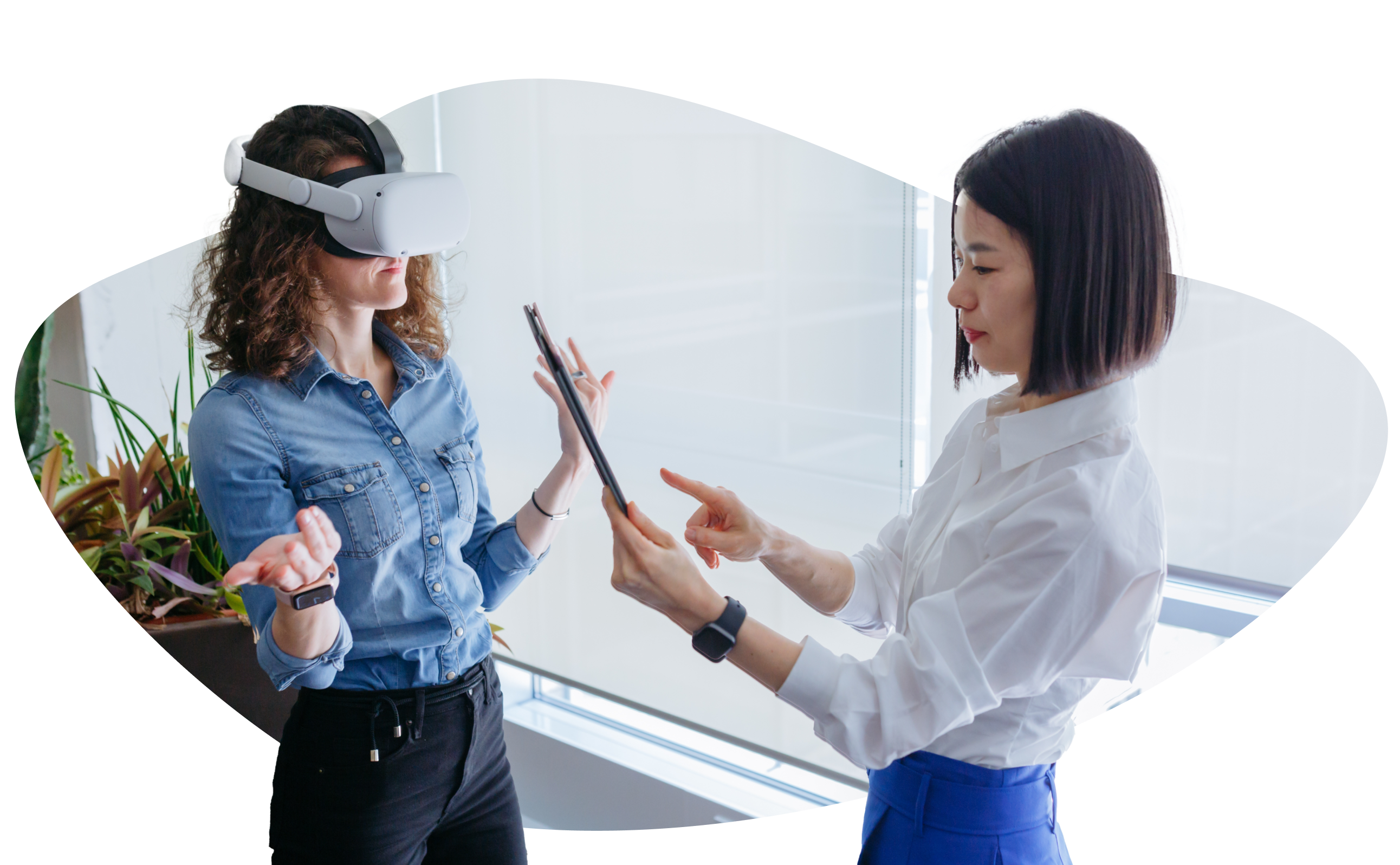 Two women working together to launch the VR education program at the college.